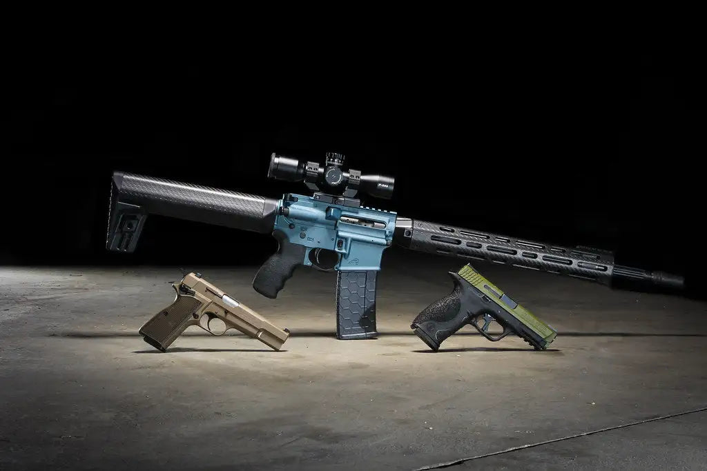 Blue ar-15 rifle with scope and stock, tactical design.