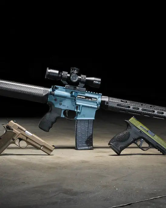 Blue ar-15 rifle with scope and tactical grip, matte finish.