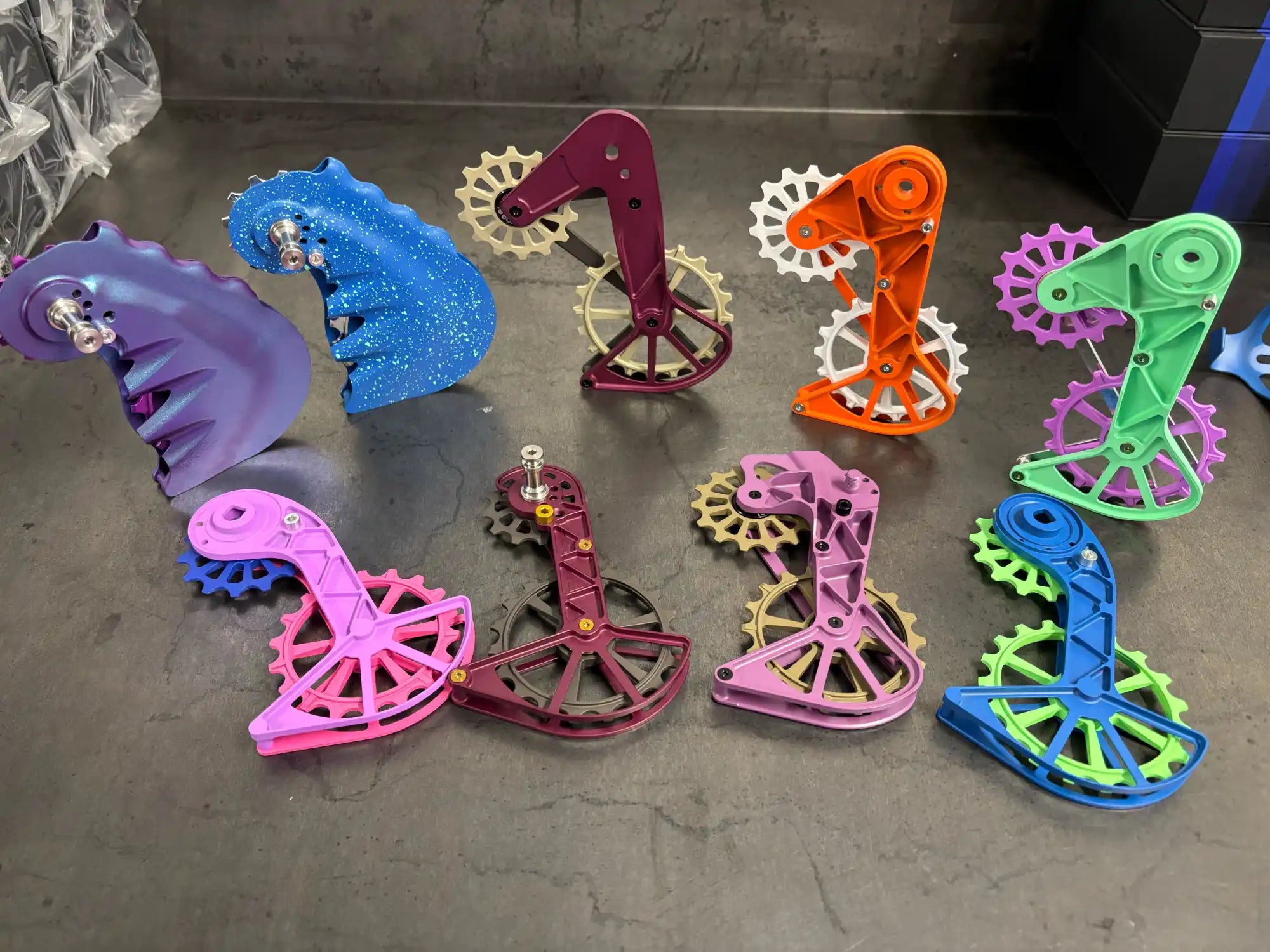 Colorful 3D-printed mechanical seahorses with gear-like decorative elements.